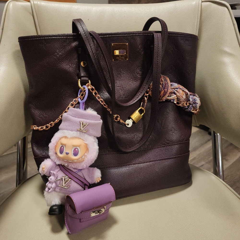 purple etro scarf and labubu